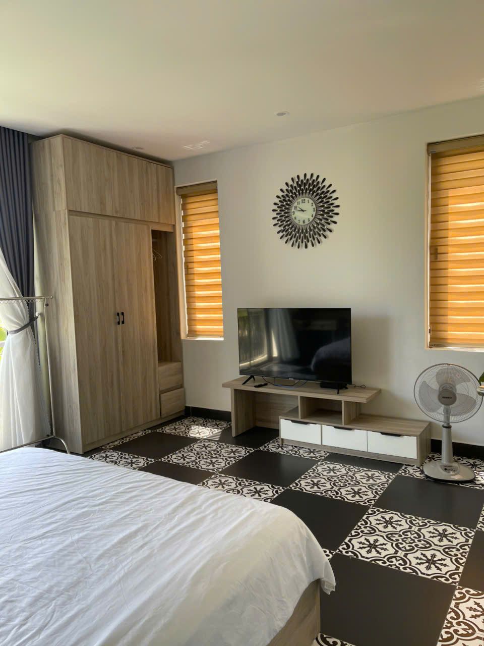 Small one-bedroom, Building B: Wardrobe and TV